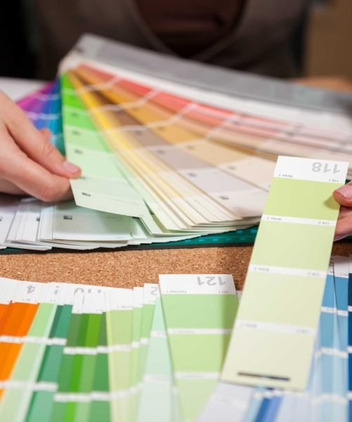 close-up-image-of-color-cards-on-architect-desk-PDTDP7N.jpg